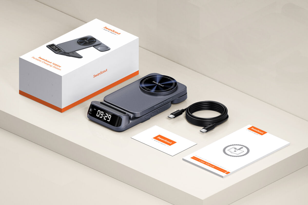 Box contents of SwanScout 708SM including charging dock, cable, and manual