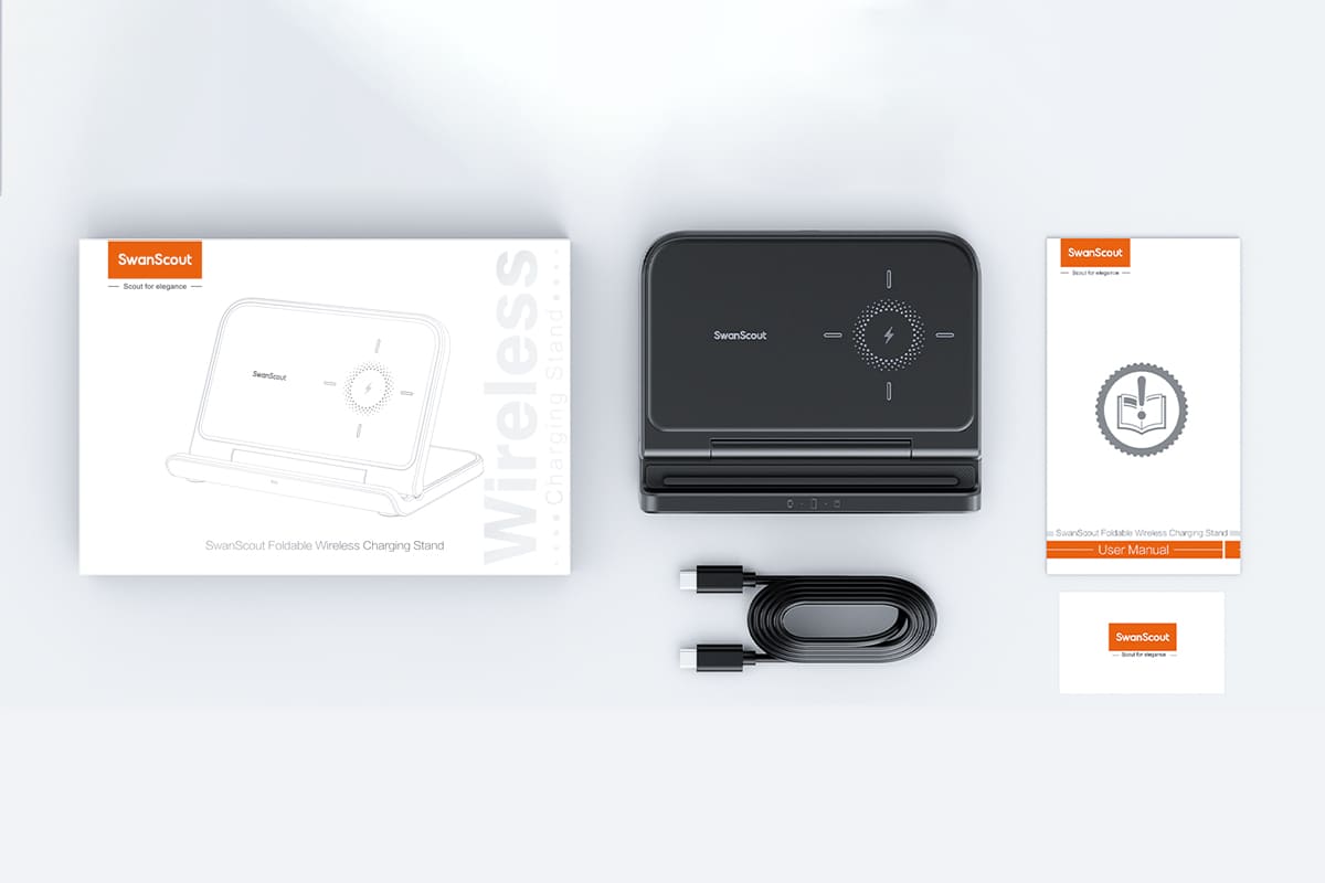 Package contents including charger USB cable user manual and warranty card for the SwanScout 503S